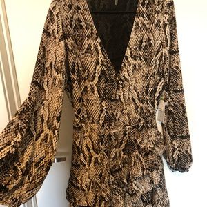 Dress size 14 but can fit down to a 10, is wrap dress so you can adjust the size